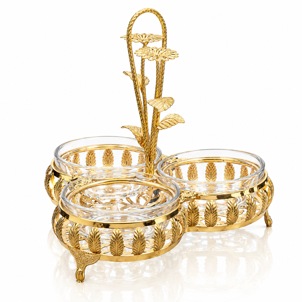 Gold leaf filigree triple serving dish with flower handle on white