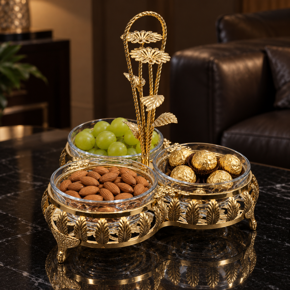 Gold triple dish with almonds, grapes and chocolates