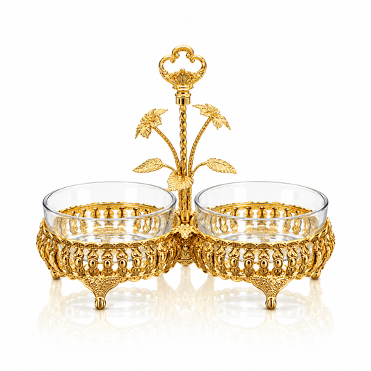 Gold filigree double serving dish with key finial handle on white