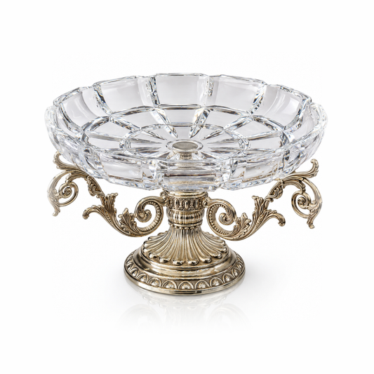 Crystal fruit bowl on ornate champagne-silver stand on white