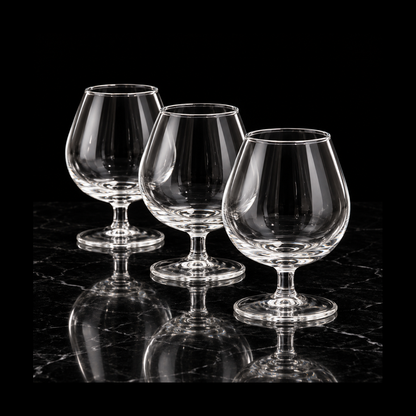 Glass snifters on black marble