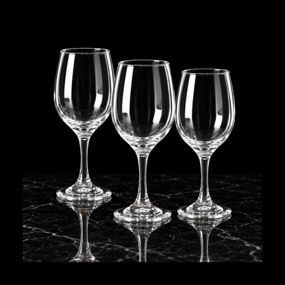 Clear wine glasses on black marble