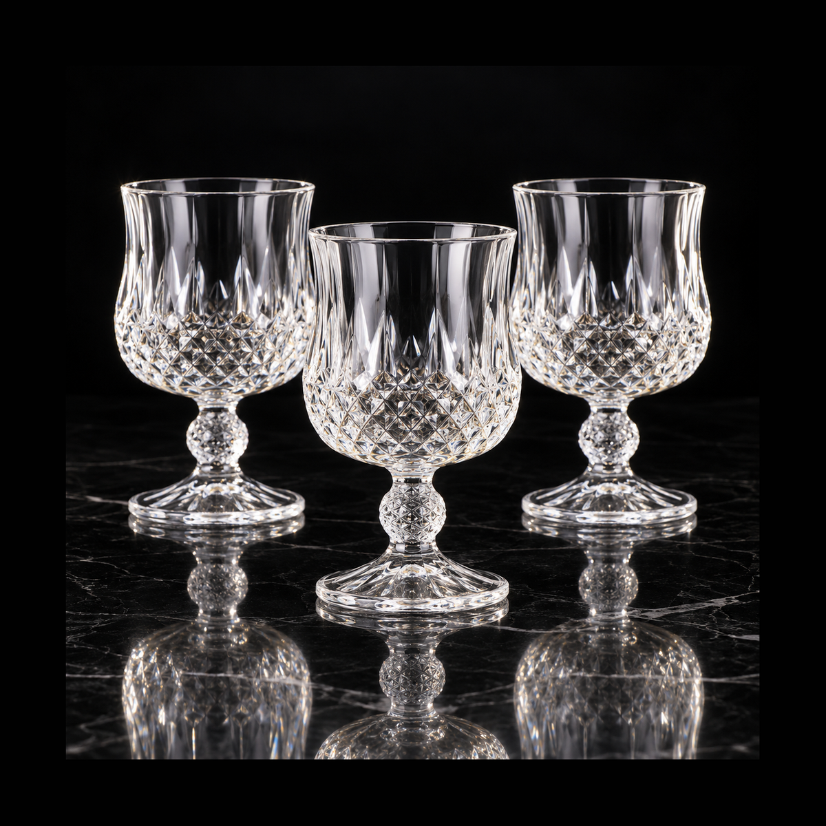 Crystal goblets on black marble