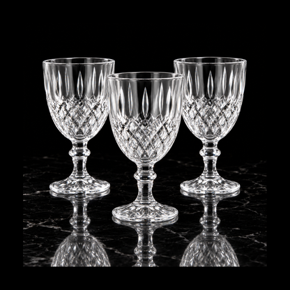 Cut crystal goblets on black marble