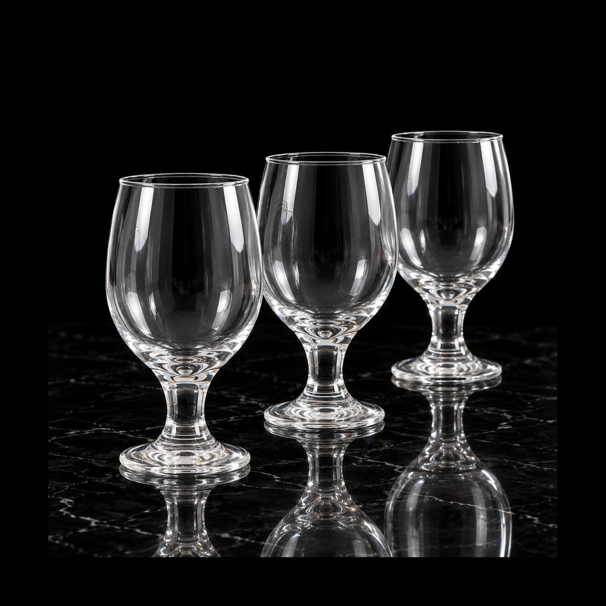 Clear goblets on black marble