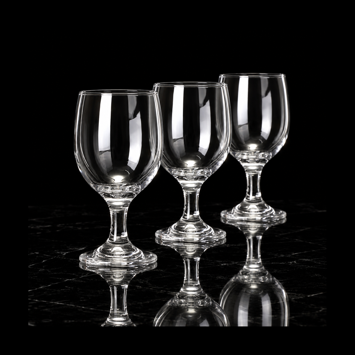 Clear goblets on black marble