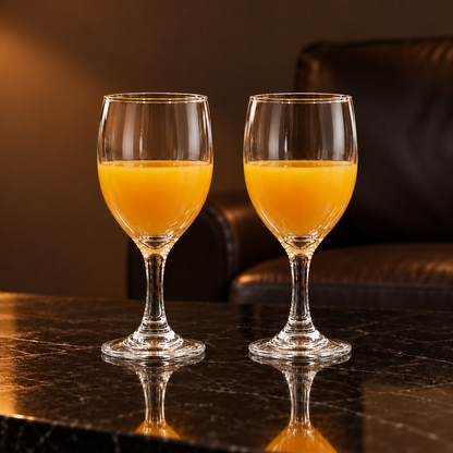 Goblets with mango juice in a living room