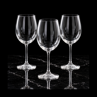 Clear wine glasses on black marble