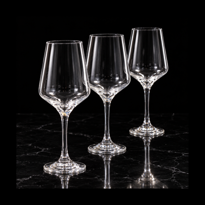 Large tulip glasses on black marble
