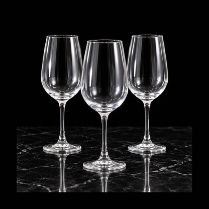 Clear wine glasses on black marble