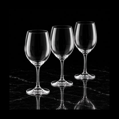 Crystal wine glasses on black marble