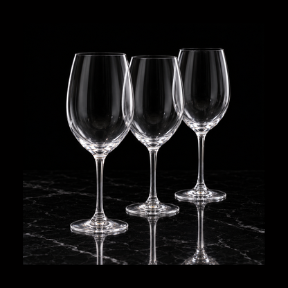 Large crystal wine glasses on black marble