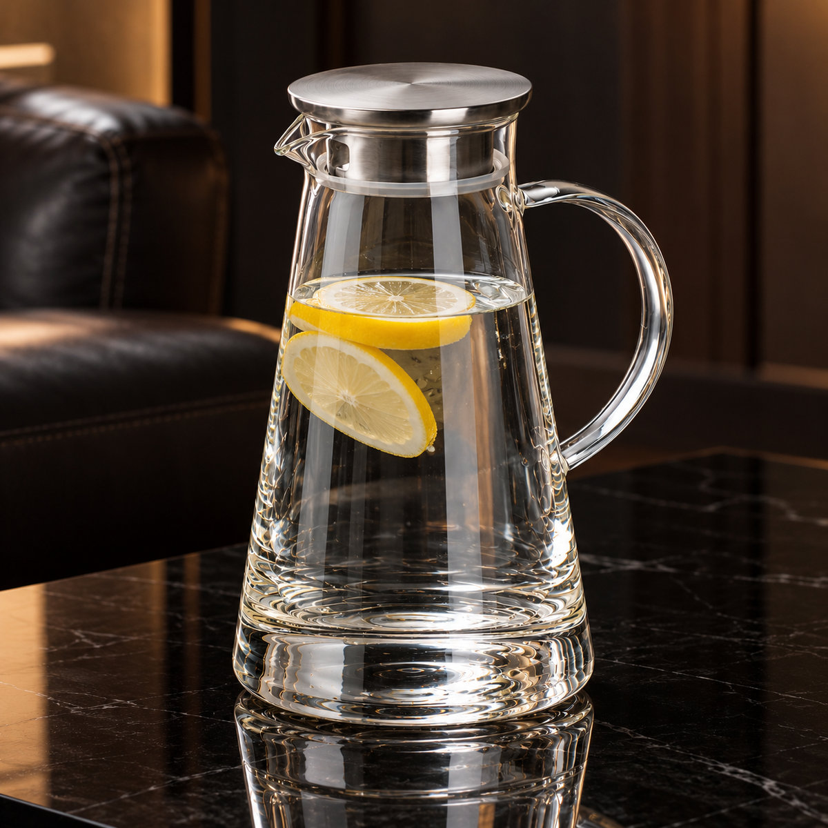 Glass water jug with steel lid in a living room