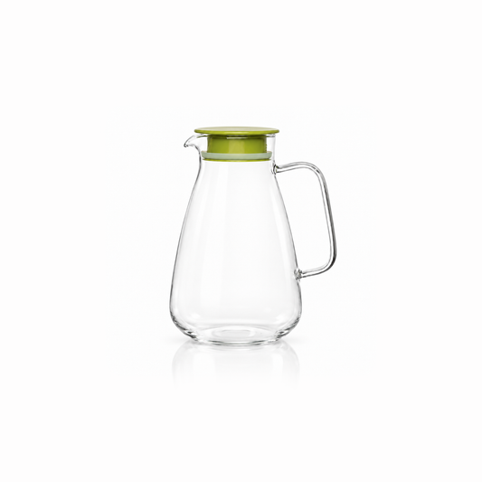 J-713 heat resistant glass jug with green lid on white