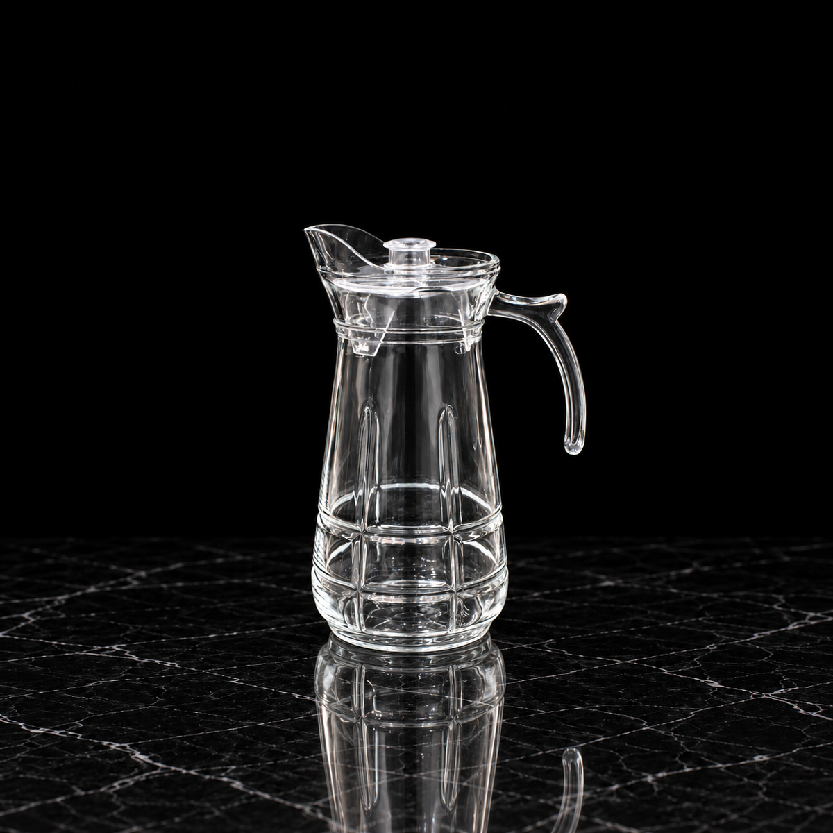 J-715 glass jug on black marble