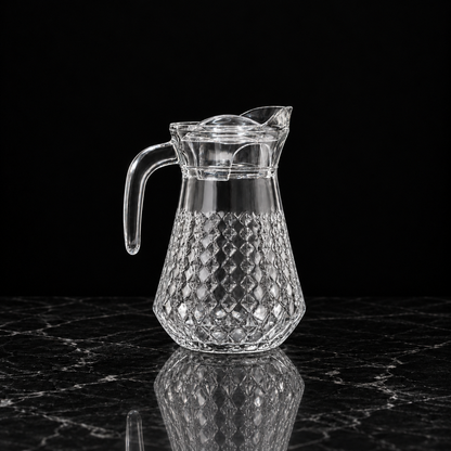 Glass jug on black marble