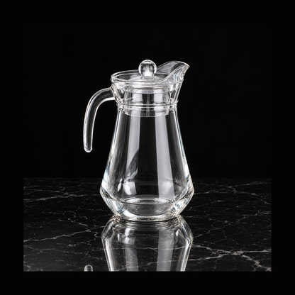 Glass jug on black marble