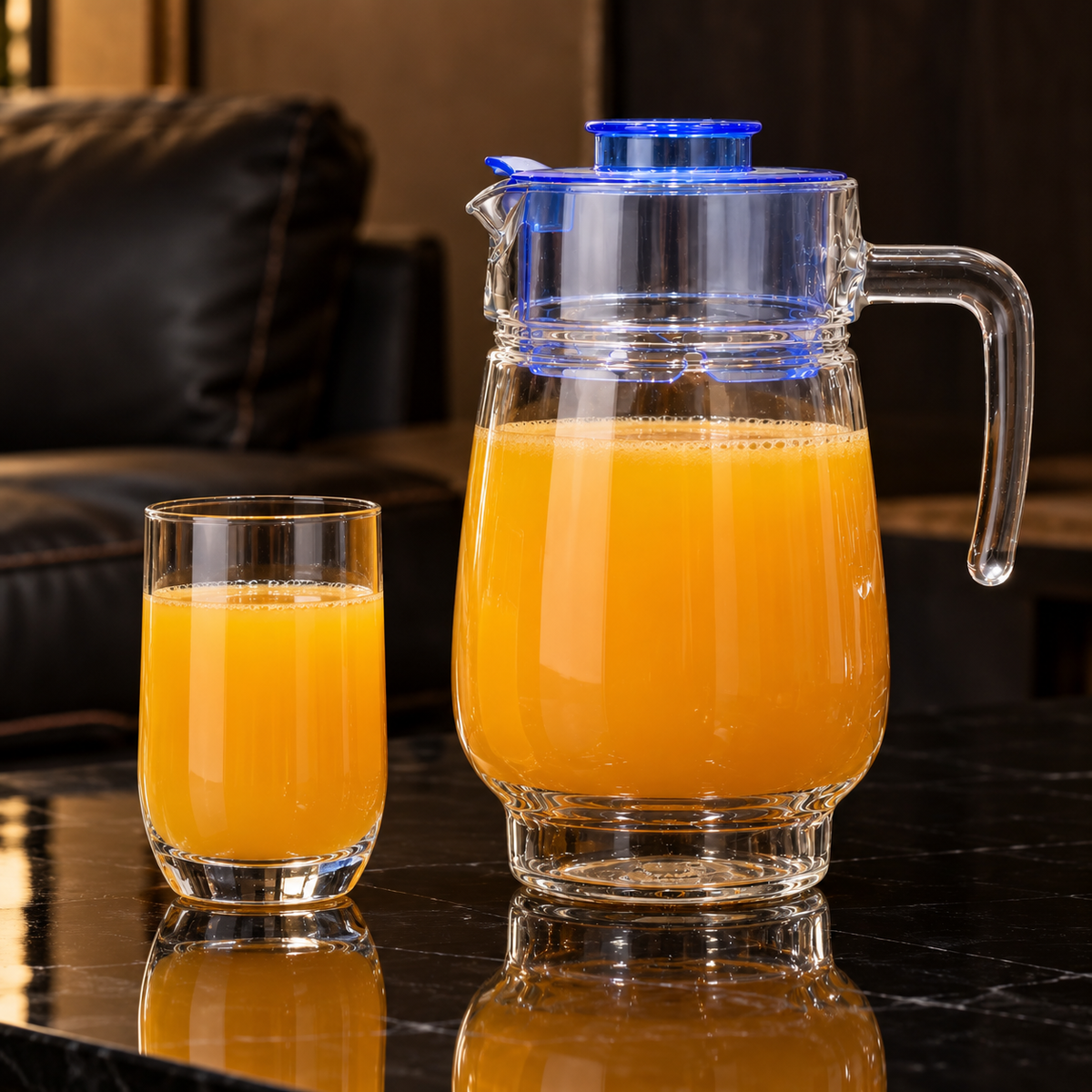 Glass jug set with blue lid in a living room