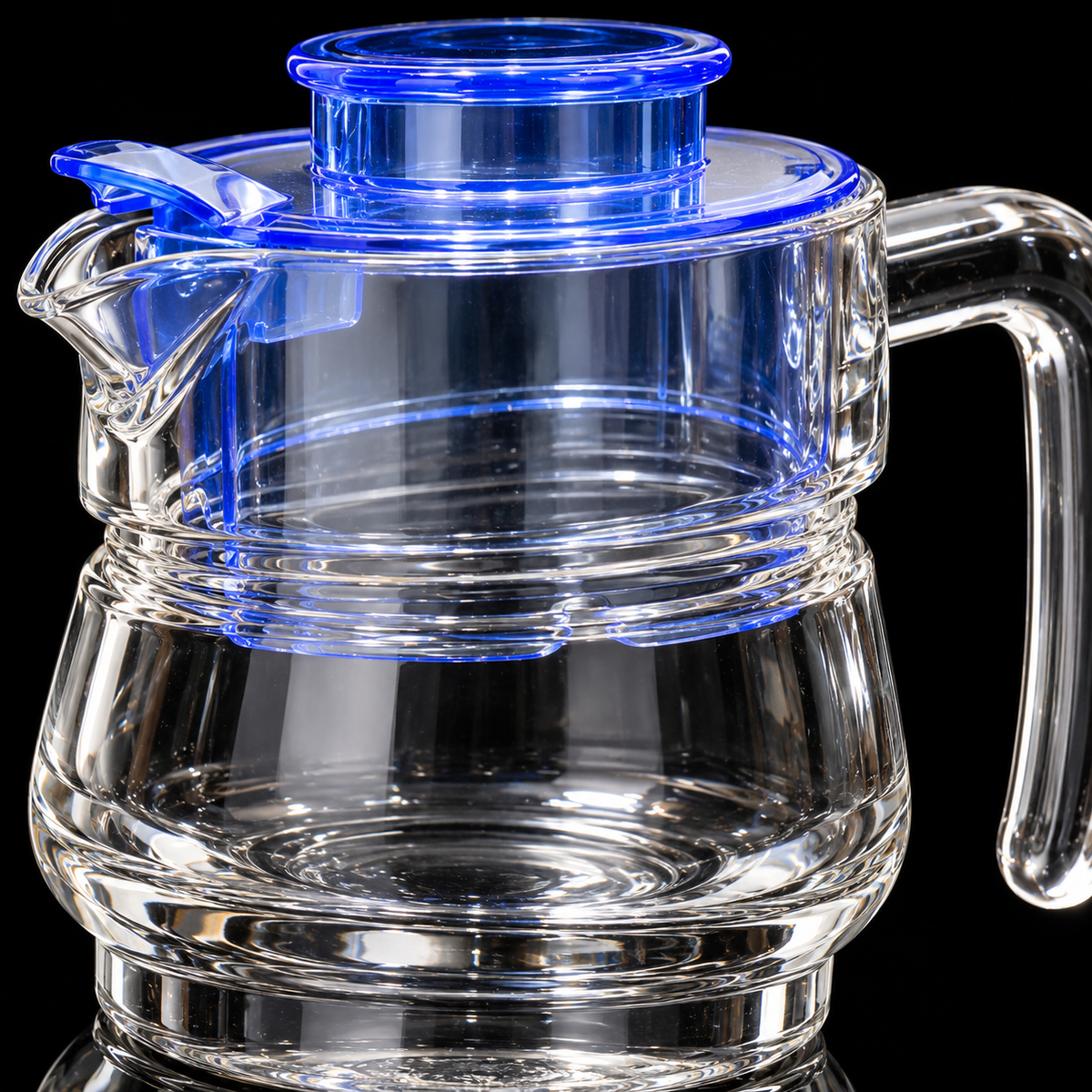 Glass jug set with blue lid detail