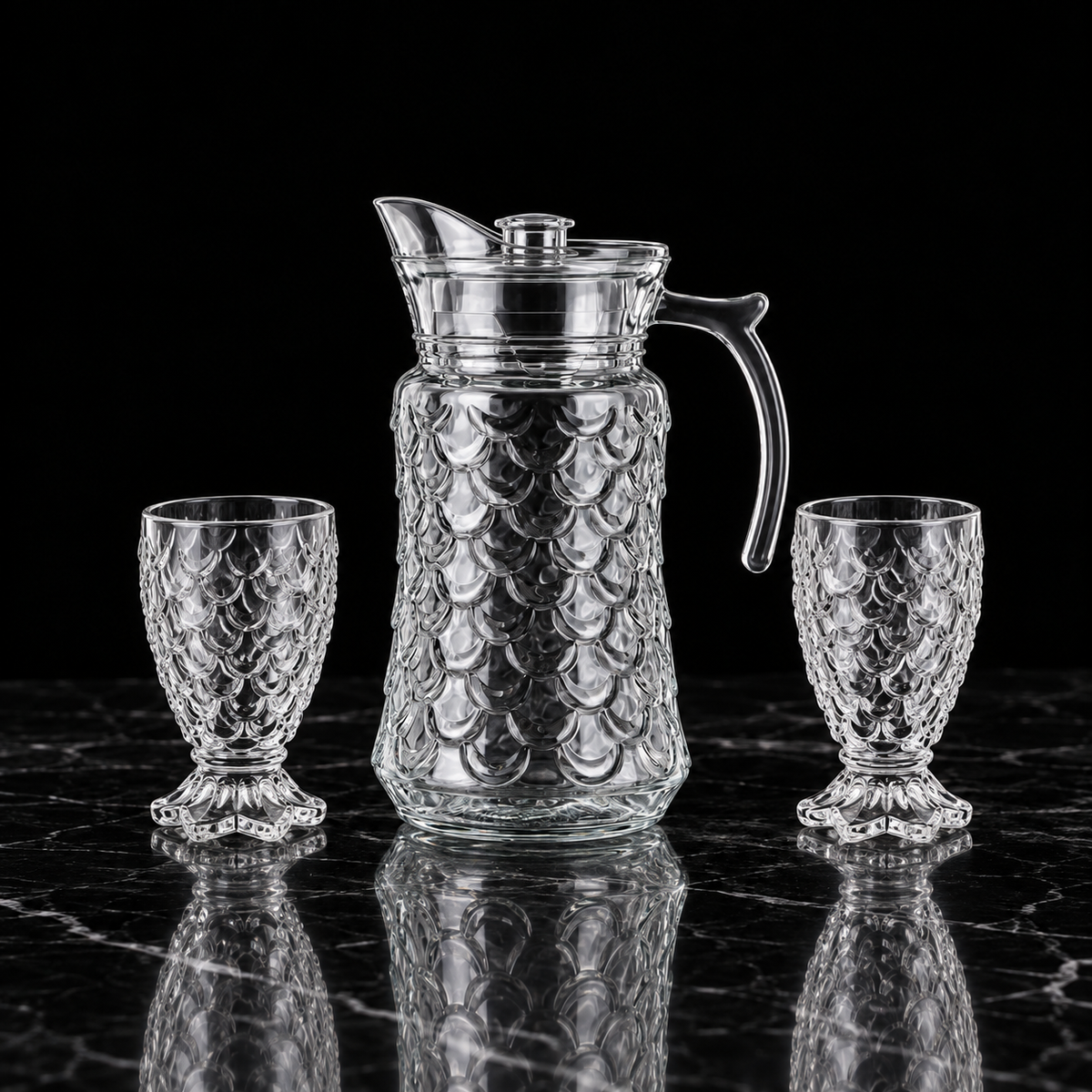 J-816 jug and tumblers on black marble