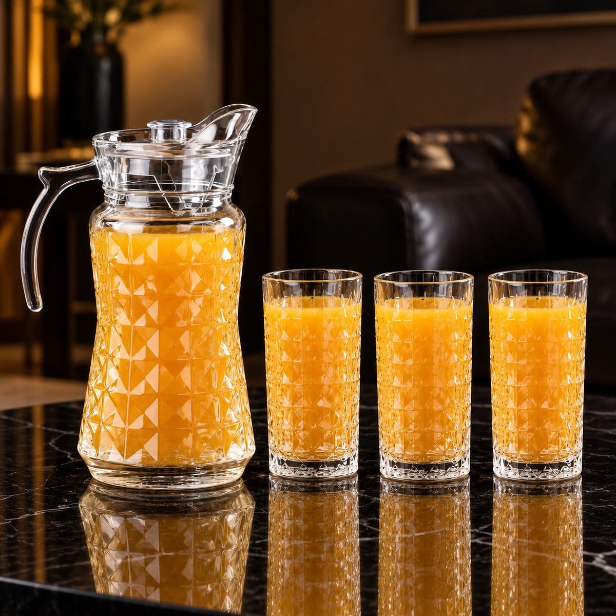 Glass jug set with mango juice in living room