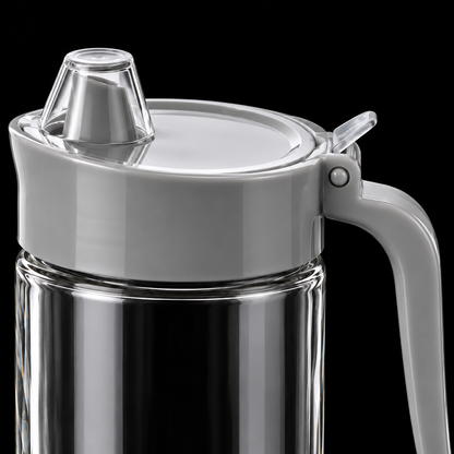 K-114 Glass Oil Dispenser Jar close-up of spout lid and handle