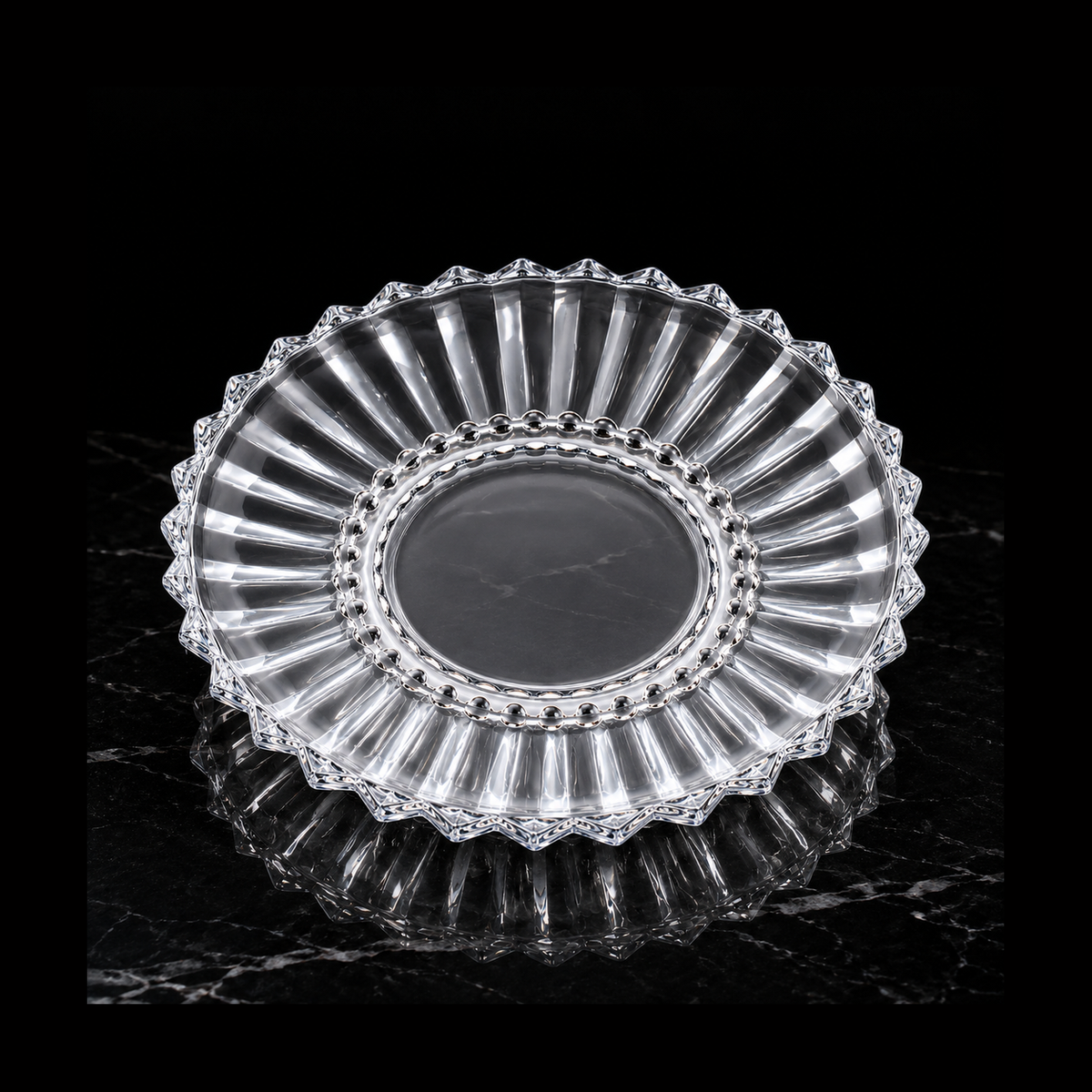 Crystal plate on black marble