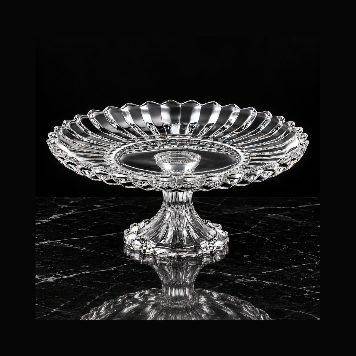 Crystal cake stand on black marble
