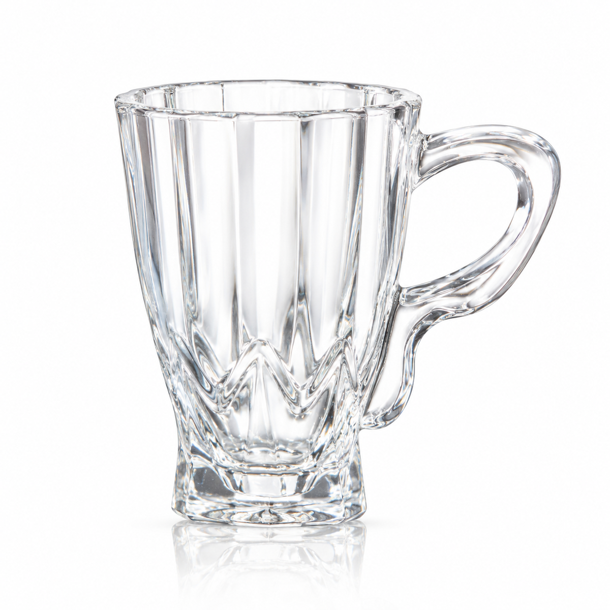 Paneled glass tea mug with wave pattern base on white