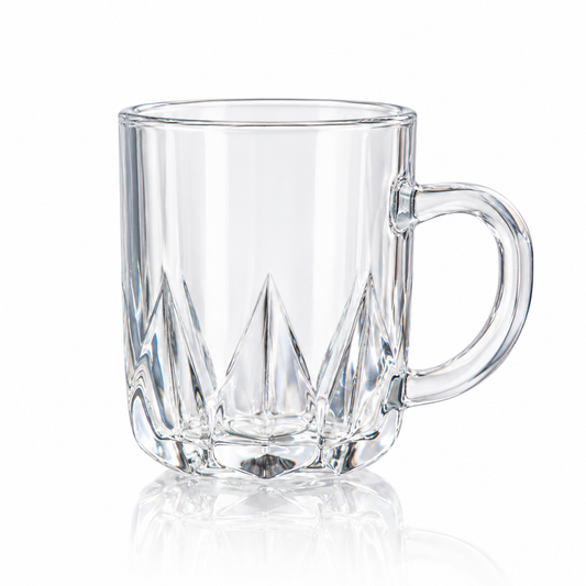 Clear glass tea mug with pointed spike cuts on white