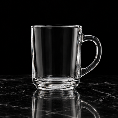 Clear glass mug on black marble