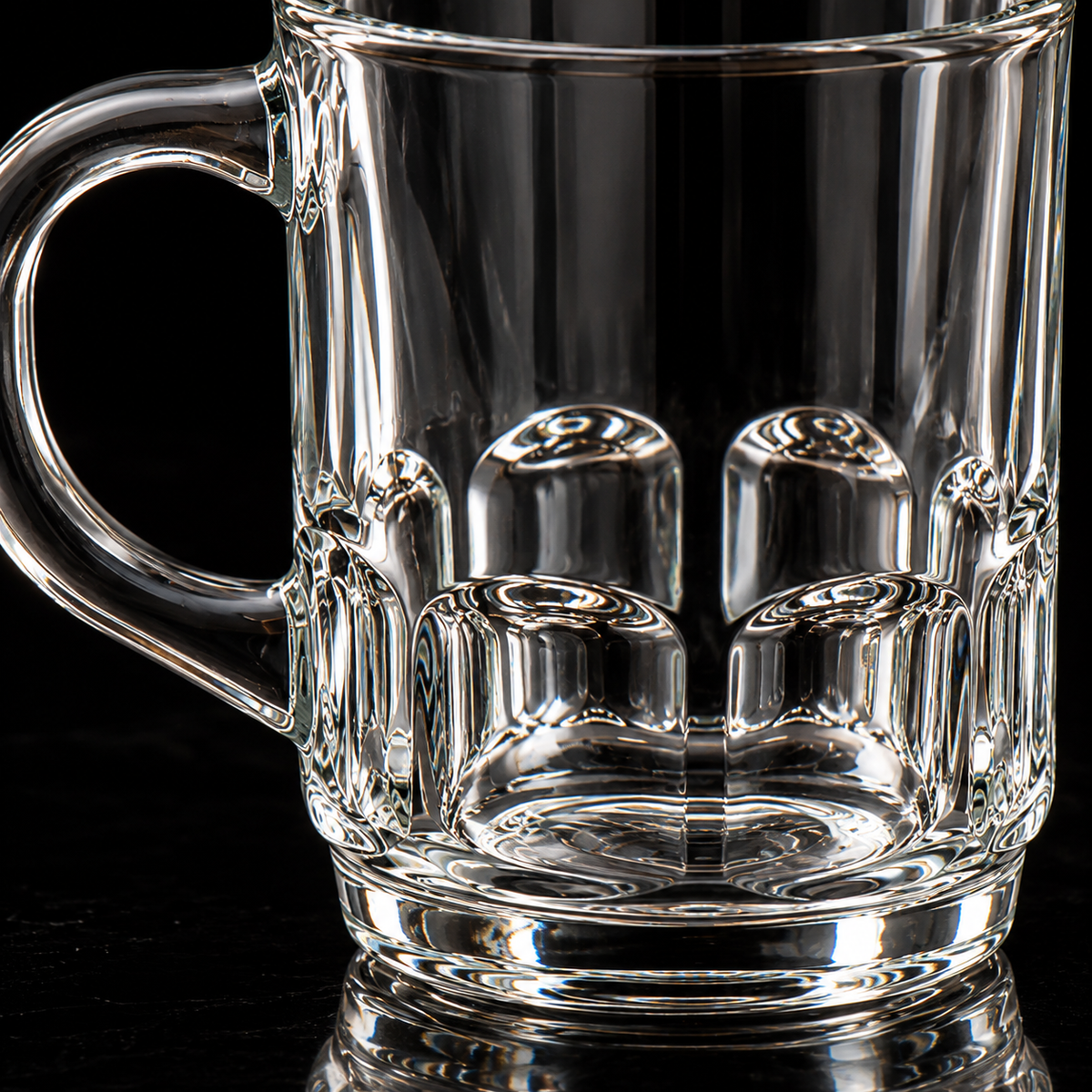 Clear glass mug with dimpled base detail