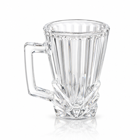 Ribbed glass tea cup with fan-cut base and square handle on white