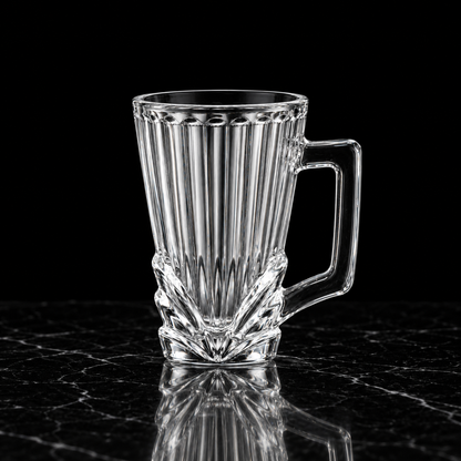 Ribbed glass cup on black marble