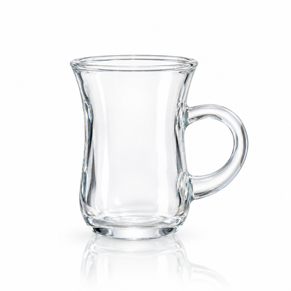 Turkish-style glass tea cup with handle on white