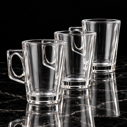 Clear glass mug on black marble