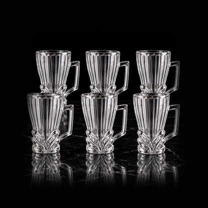 Leaf cut glass tea mugs on black marble