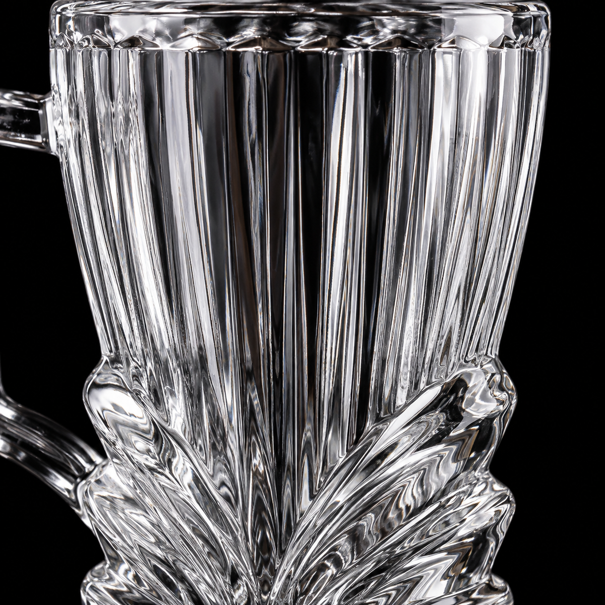 Leaf cut glass tea mug close-up