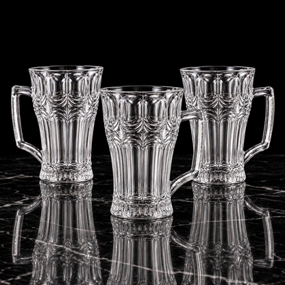 Arch cut glass tea mugs on black marble