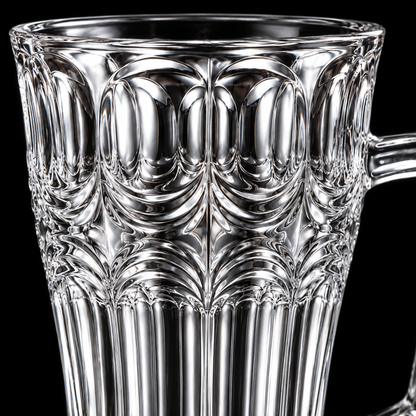 Arch cut glass tea mug close-up