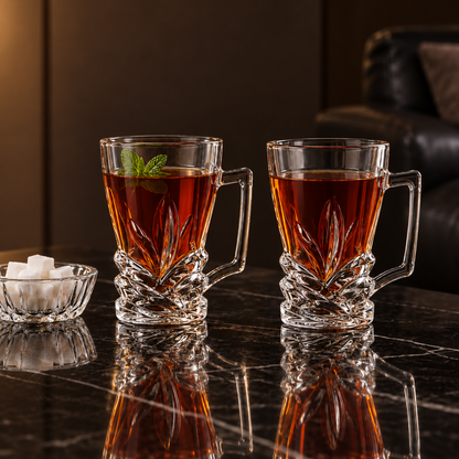 Leaf cut glass tea mugs with mint tea in a living room