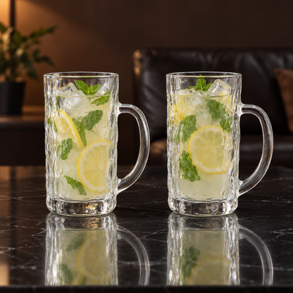 Hammered glass mugs with lemonade in a living room