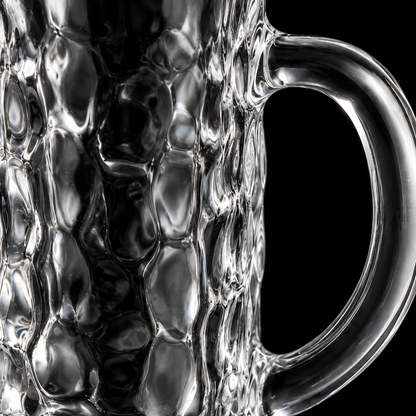 Hammered glass mug texture close-up