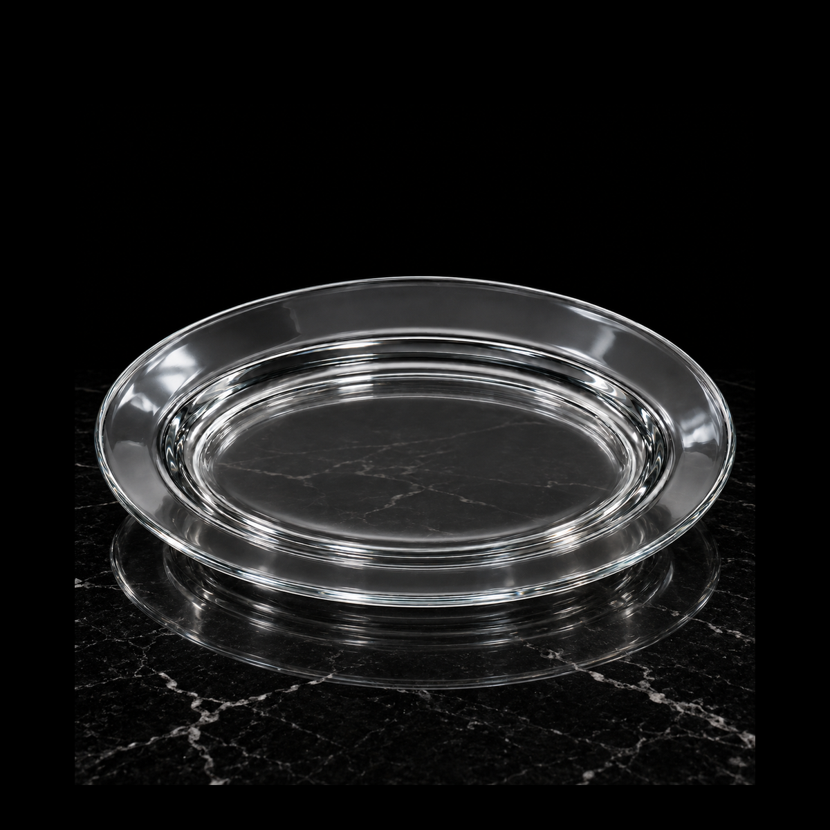 P-117 oval glass platter on black marble