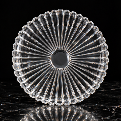 Crystal sunburst serving plate on black marble
