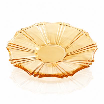 Amber glass serving plate on white marble