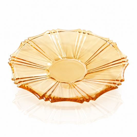 Amber glass serving plate on white marble