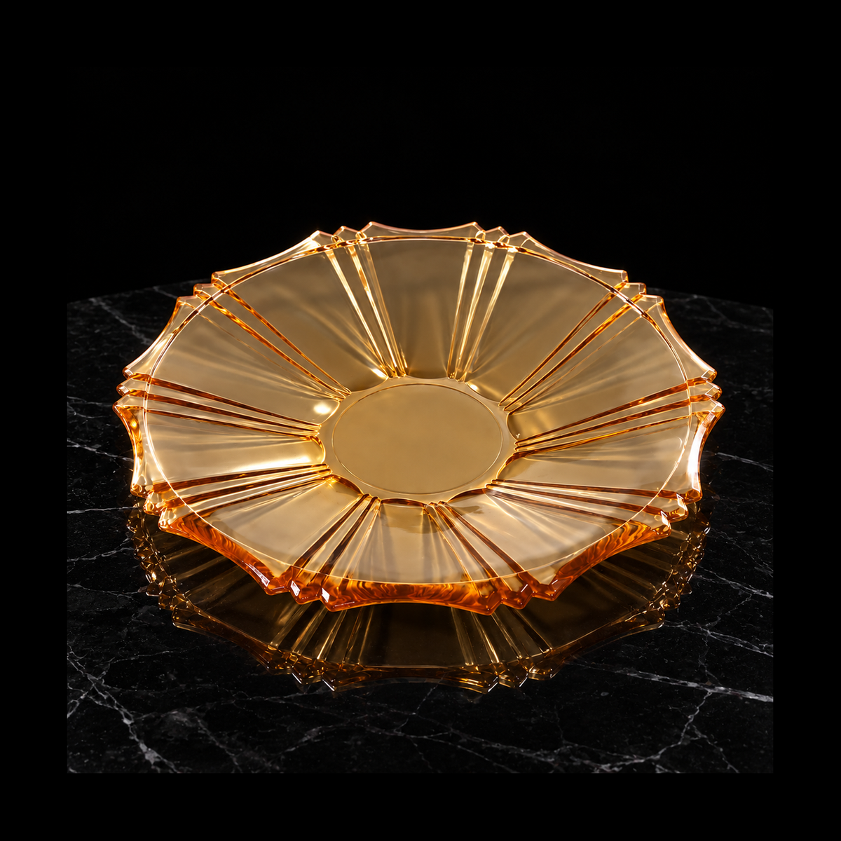 Amber glass serving plate on black marble