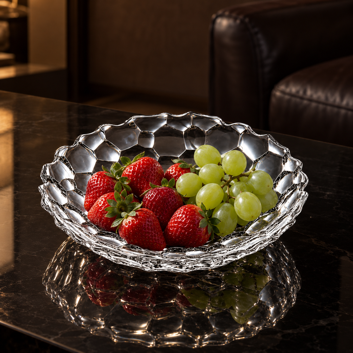Crystal plate with strawberries and grapes in a living room