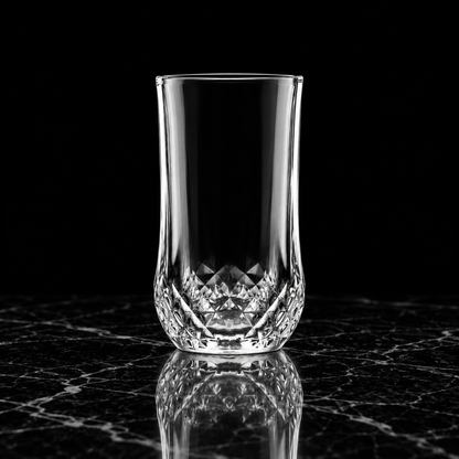T-140 diamond-cut highball glass on black marble